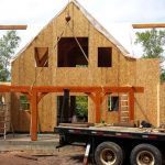 custom timber frame home being built