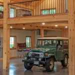 custom timber frame barn interior with jeep