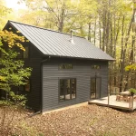 timber cabin with black siding