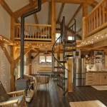 timber cabin interior with iron spiral staircase